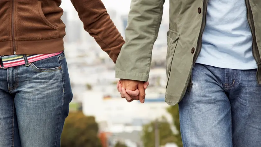 Couple Holding Hands --- Image by © Royalty-Free/Corbis