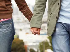 Couple Holding Hands --- Image by © Royalty-Free/Corbis