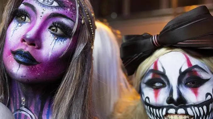 epa07133571 Costumed revellers attend Halloween celebrations in Lan Kwai Fong in Hong Kong, China, 31 October 2018. Halloween originated from ancient Celtic harvest festivals and is celebrated annually in several countries on 31 October. EPA/ALEX HOFFORD