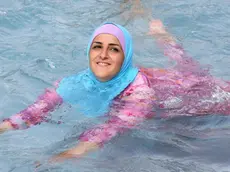 Una ragazza in burkini. ANSA/STEPHANIE PILICK