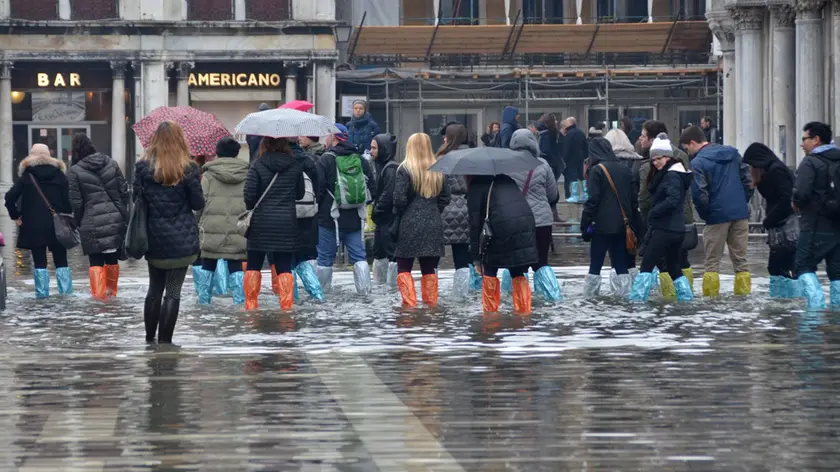 Domenica di pioggia e acqua alta