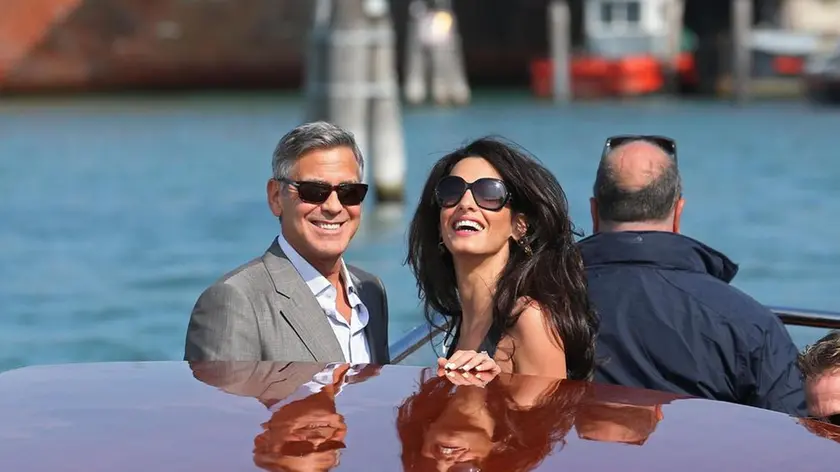 George Clooney and his girlfriend Amal Alamuddin arrive in Venice, 26 September 2014. The civil ceremony is expected to take place in a 14th century palace, owned by the Venice council, almost in front of the Aman resort.ANSA/ALESSANDRO DI MEO