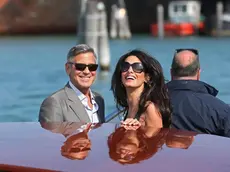 George Clooney and his girlfriend Amal Alamuddin arrive in Venice, 26 September 2014. The civil ceremony is expected to take place in a 14th century palace, owned by the Venice council, almost in front of the Aman resort.ANSA/ALESSANDRO DI MEO