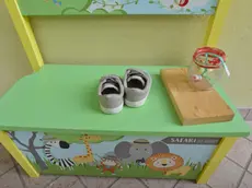 Le scarpine della piccola Viviana Maria Barel (foto Macca Cavicchi)