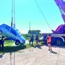 Le operazioni di recupero dell'auto dal Sile (foto Bortoluzzi)