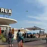 Il luogo del malore e l'intervento dell'elisoccorso a Lignano