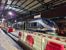 Un treno elettrico alla stazione di Belluno