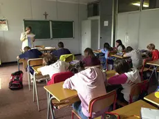 Una docente in classe