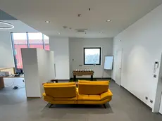 Uno spazio uffici con biliardino nella Hybrid tower di Mestre