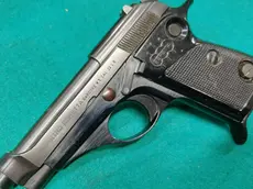 Una pistola Beretta simile a quella che il bancario portava a lavoro