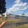 Il cartello davanti alla fabbrica Exor di Buja