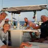 Franco Schito (a destra) con la sua famiglia in barca in Grecia