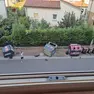 I cassonetti colpiti dall'auto fuori controllo