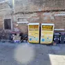 I cassonetti gialli e i rifiuti abbandonati a ridosso dell’ex monastero