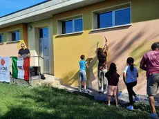 Adulti e bambini al lavoro