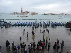 Interpress/M.Tagliapietra Venezia 19.11.2013.- Acqua alta in piazza San Marco.