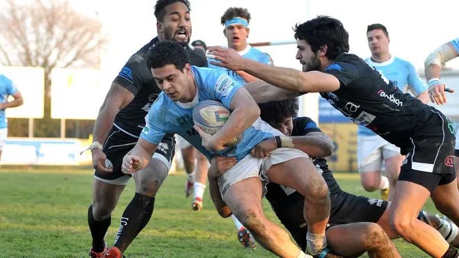 (CRUCCU) SAN DONA' DI PIAVE 10/02/2013 MATTEO BOEM.M-THREE RUGBY (MAGLIA AZZURRA) VS CAVALIERI.N¡12 FLYNN ROBERT CULUM (M-THREE)..