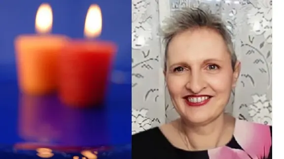 Symbol of death and dolefulness or tenderness _ two burning candles