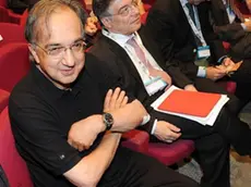 Sergio Marchionne A.D. FIAT con il ministro Flavio Zanonato durante l'assemblea generale degli associati 2013 dell'Unione Industriale, Torino,8 luglio 2013 ANSA/ ALESSANDRO DI MARCO