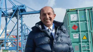 Il presidente dell'Autorita' Portuale di Genova Luigi Merlo, durante le operazioni di carico e scarico nel terminal SECH di Calata Sanità. 05 marzo 2014 a Genova. ANSA/LUCA ZENNARO