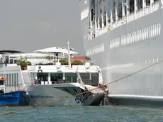 The MSC cruise ship Opera is seen after the collision with a tourist boat, in Venice, Italy, 02 June 2019. The cruise ship smashed into a dock located on the Giudecca canal in Venice this morning. Tugs could not maintain control of the MSC cruise ship as it violently struck the dock and then struck the stern of the 'River Countess' tourist boat which was docked. Four people were taken to the hospital. ANSA/ ANDREA MEROLA