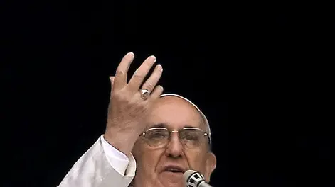 Foto LaPresse.FOTO DI REPERTORIO.24/12/2013.Papa Francesco stasera celebra la sua prima Messa di Natale in Vaticano...Pope Francis gestures as he delivers his Angelus prayer from the window of his studio overlooking St. Peter's Square, at the Vatican, Sunday, March 17, 2013. Breaking with tradition, Pope Francis delivered off-the-cuff remarks about God's power to forgive instead of reading from a written speech for the first Sunday window appearance of his papacy. He also spoke only in Italian, beginning with "buon giorno" (Good day) and ending with "buon pranzo" (Have a good lunch), instead of greeting the faithful in several languages as his last few predecessors had done. (AP Photo/Gregorio Borgia)