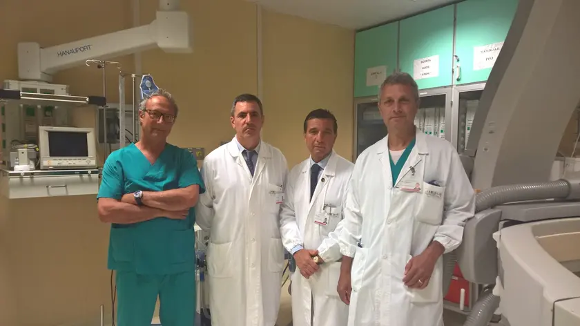 Il team di specialisti dell'Angelo: da sinistra gli anestesisti Lazzari e Farnia, il chirurgo Breda e il cardiologo Caprioglio