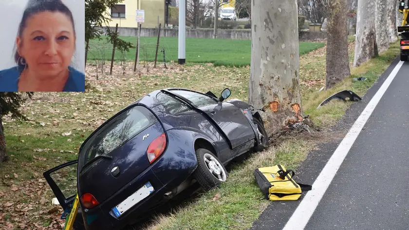 Nicoletta Penesic e la sua automobile distrutta (foto Dino Tommasella)