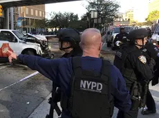 New York City Police Officers respond to report of gunfire along West Street near the pedestrian bridge at Stuyvesant High School in lower Manhattan in New York, Tuesday, Oct. 31, 2017. (Martin Speechley/NYPD via AP)