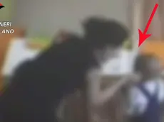 Frame tratti dal video realizzato dai carabinieri di Milano con delle telecamere nascoste, dopo le denunce presentate da due ex collaboratrici, che hanno potuto documentare le violenze nei confronti dei bambini all'interno dell'asilo privato Baby World Bicocca di Milano, Roma, 1 agosto 2016. ANSA/UFFICIO STAMPA CARABINIERI