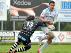 (CRUCCU) SAN DONA' DI PIAVE 23/03/2013 MATTEO BOEM.M-THREE RUGBY (MAGLIA BIANCA-AZZURRA) VS PETRARCA.N¡12 FLYNN ROBERT CULUM (M-THREE RUGBY)..