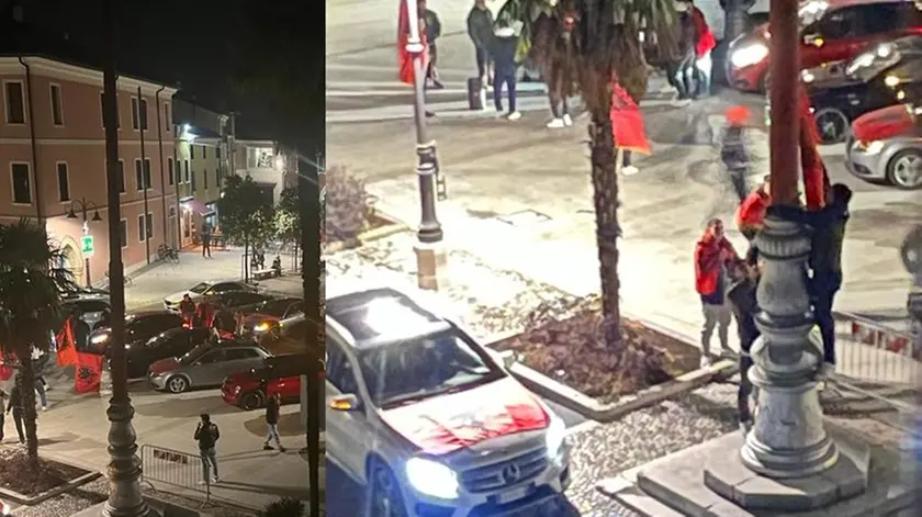 La piazza invasa dalle auto e il tentativo di issare la bandiera albanese sul pennone del Tricolore