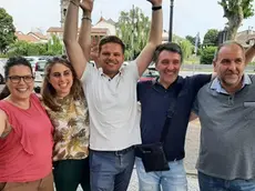 Marco Dori, al centro, festeggia la vittoria