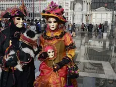 Interpress/Tagliapietra Venezia 09.02.2013.- Carnevale. Acqua alta e maschere in Piazza San Marco.