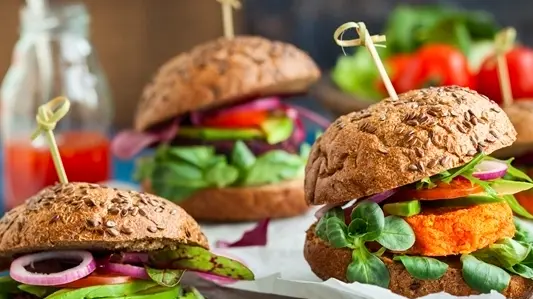 Veggie beet and carrot burgers with avocado