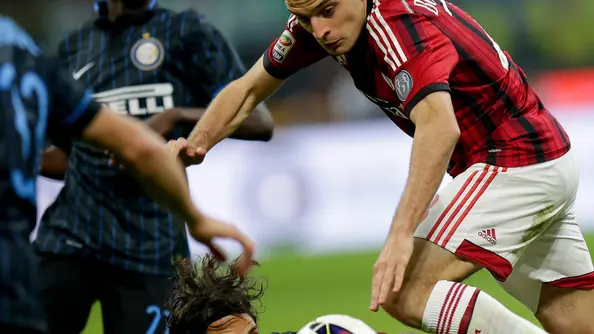 Foto LaPresse/Roberto Bregani.19 Aprile 2015 Milano (Italia).sport calcio.Inter vs Milan - Campionato di calcio Serie A Tim 2014 2015 - Stadio "San Siro".Nella foto: Andrea Poli e Andrea Ranocchia...Foto LaPresse/Roberto Bregani.19 April 2015 Milan (Italy).sport soccer.Inter vs AC Milan - Italian Football Championship League A Tim 2014 2015 - "San Siro" Stadium.In the pic: Andrea Poli and Andrea Ranocchia..