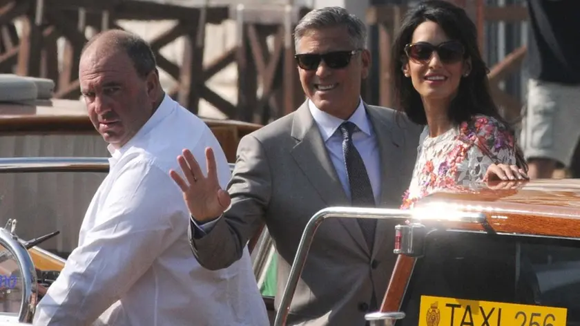 Interpress/Mazzega Morsego Venezia, 28.09.2014.- ore 14.55 l'ucita di George e Amal Clooneyd in Taxi "Amore" per l'Hotel Cipriani Giudecca