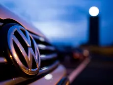 A Volkswagen logo on a vehicle in a staff parking lot at the VW plant in Wolfsburg, Germany, 22 September 2015. ANSA/JULIAN STRATENSCHULTE