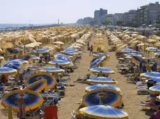 Jesolo (VE):.La spiaggia..02/08/2001 © Light Image Studio..Morsego.