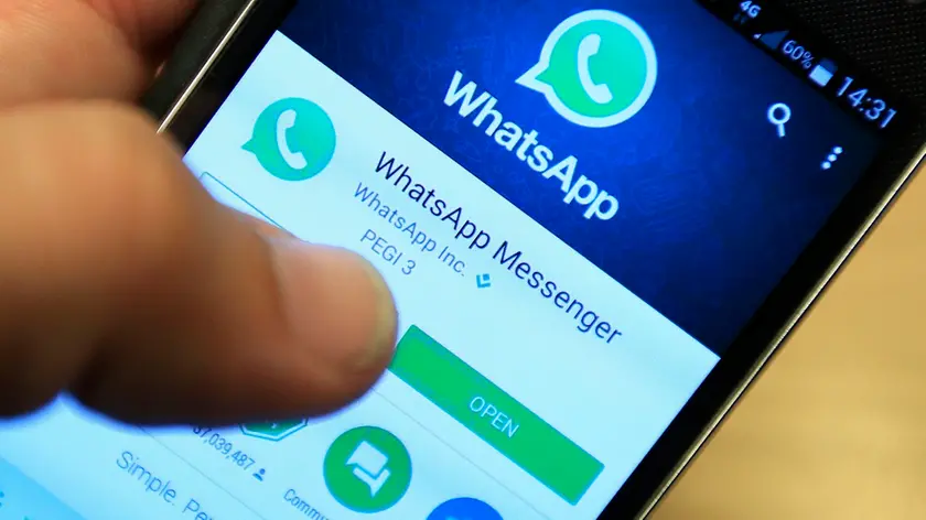 File photo dated 06/04/16 of Whatsapp being used on a smartphone. Businesses could soon be able to target WhatsApp users following surprise changes to the messaging app's privacy policy. PRESS ASSOCIATION Photo. Issue date: Thursday August 25, 2016. The Facebook-owned message service, which is otherwise known for its end-to-end encryption and stringent privacy terms, assured users in a blog post Thursday that their phone numbers would not be made public and that messages would remain encrypted. See PA story CITY WhatsApp. Photo credit should read: Jonathan Brady/PA Wire