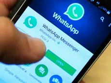 File photo dated 06/04/16 of Whatsapp being used on a smartphone. Businesses could soon be able to target WhatsApp users following surprise changes to the messaging app's privacy policy. PRESS ASSOCIATION Photo. Issue date: Thursday August 25, 2016. The Facebook-owned message service, which is otherwise known for its end-to-end encryption and stringent privacy terms, assured users in a blog post Thursday that their phone numbers would not be made public and that messages would remain encrypted. See PA story CITY WhatsApp. Photo credit should read: Jonathan Brady/PA Wire