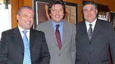 Roberto Agnellini, al centro tra Ugo e Arrigo Poletti