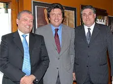 Roberto Agnellini, al centro tra Ugo e Arrigo Poletti