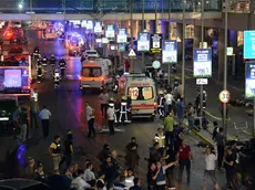 Turkish rescue services gather outside Istanbul's Ataturk airport, Tuesday, June 28, 2016. Two explosions have rocked Istanbul's Ataturk airport, killing several people and wounding others, Turkey's justice minister and another official said Tuesday. A Turkish official says two attackers have blown themselves up at the airport after police fired at them. The official said the attackers detonated the explosives at the entrance of the international terminal before entering the x-ray security check. (Ismail Coskun, IHA via AP) TURKEY OUT