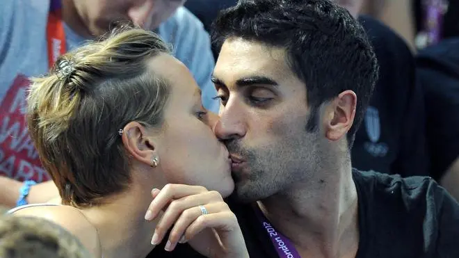 Filippo Magnini kisses his girlfriend Federica Pellegrini during men's water polo quarter-final match between Italy and Hungary in the London 2012 Summer Olympic Games in the Water Polo Arena in London, Great Britain, 08 August 2012. ANSA/ETTORE FERRARI