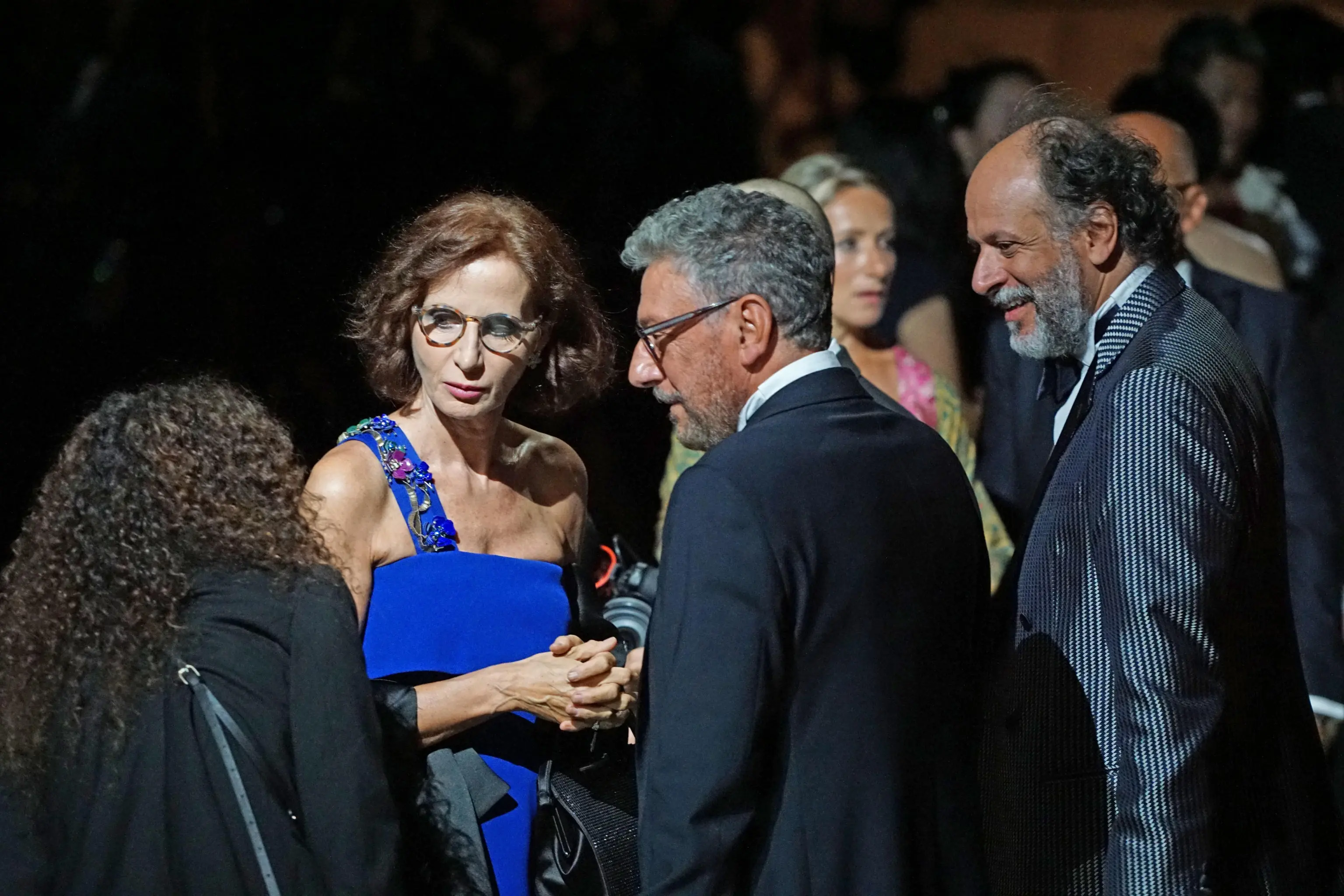 The Italian actress Margaret Mazzantini, italiam director Sergio Castellito and italian director Luca Guadagnino during the fashion show the One Night Only Venezia , by italian fashion designer Giorgio Armani at Arsenale on September 02, 2023 in Venice, Italy. ANSA/ANDREA MEROLA