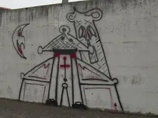 FGAVAGNIN PROVINCIA PORTOGRUARO GRAFFITI SATANICI SUL MURO DEL CIMITERO (SUMMAGA)