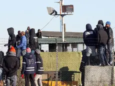 A revolt in a migrant centre at Cona near Venice ended Tuesday, Italy, 03 January 2017. The migrants protested overnight by holing up in some containers and barricading 25 volunteers, after the sudden death of a young Ivorian woman. The migrants said the emergency services were slow in responding, a charge the services rejected..ANSA/ANDREA MEROLA