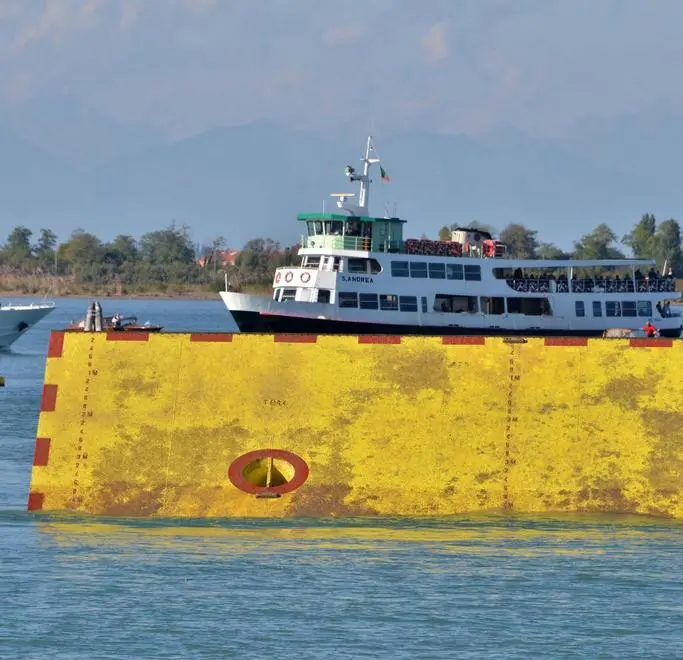 12 Oct 2013 --- Four large floodgates rose out of the water creating a temporary sea barrier designed to protect the Italian city of Venice from flooding during high tides have been successfully tested for the first time in Venice, 12 October 2013. Once completed, 78 mobile flood barriers will be raised from the seabed to shut off the lagoon in the event of rising sea levels and winter storms. ANSA/ANDREA MEROLA --- Image by © ANDREA MEROLA/ANSA/Corbis