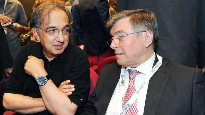 Sergio Marchionne A.D. FIAT con il ministro Flavio Zanonato durante l'assemblea generale degli associati 2013 dell'Unione Industriale, Torino,8 luglio 2013 ANSA/ ALESSANDRO DI MARCO